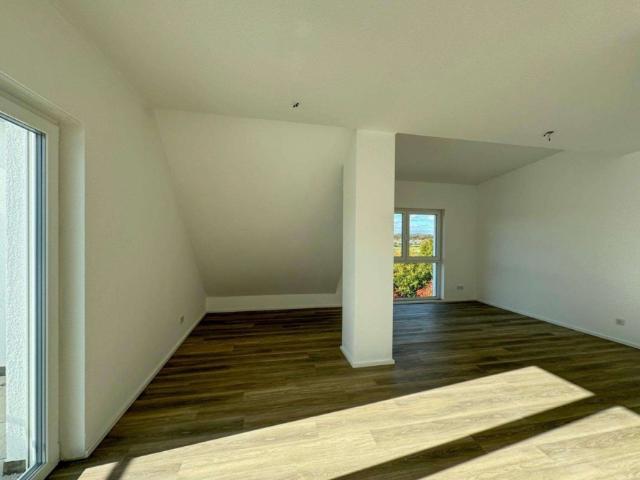 Geräumige Dachgeschosswohnung mit Balkon