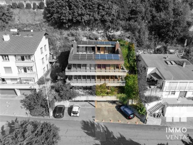 Gestaltungsfreie Haushälfte mit Dachterrasse über Biel