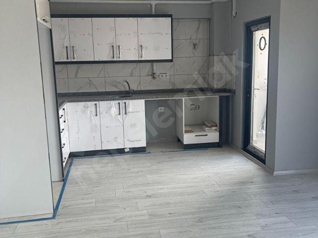 GEYİKLİ MERKEZDE GENİŞ VE FERAH 1+1 KİRALIK DAİRE
