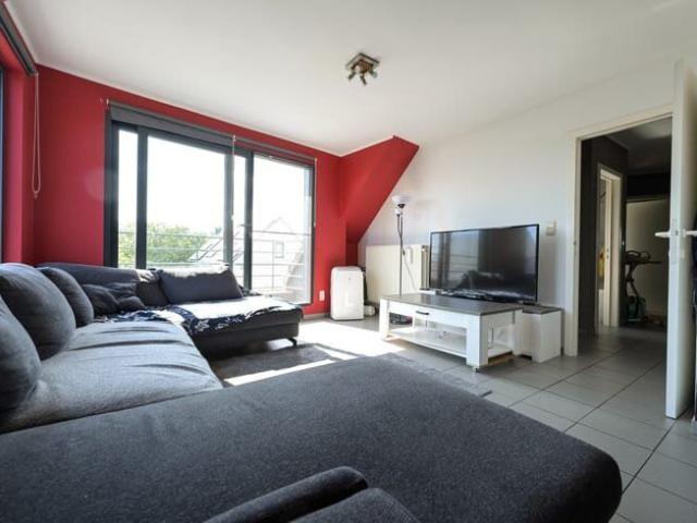 Gezellig appartement met 2 slaapkamers, garage en terras.