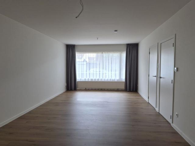 Gezellig gelijkvloers appartement met tuintje en parking