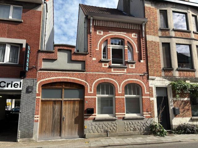 Gezellige rijwoning 4 slaapkamers + garage en stadstuin