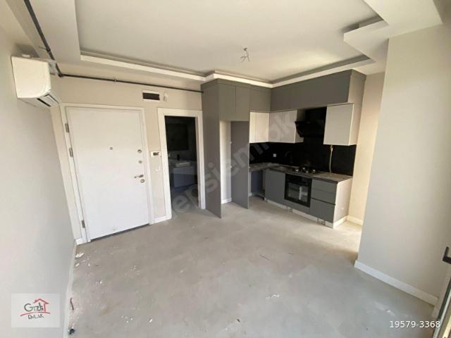 GİZLİ EMLAK'TAN B.BELEDİYE KARŞISI K.BALKONLU, KLİMALI 1+1 DAİRE