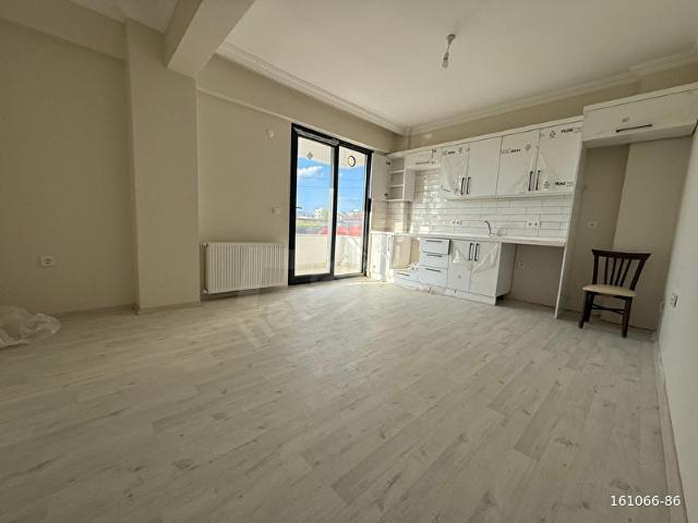 GÖMEÇ KARAAĞAÇ MAHALLESİ'NDE SATILIK 2+1 AÇIK MUTFAK DAİRE