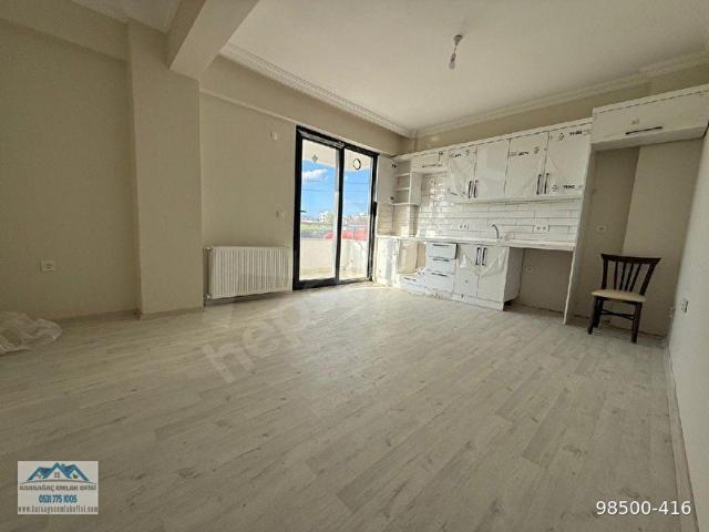 GÖMEÇ KARAAĞAÇ MAHALLESİ'NDE SATILIK 2+1 AÇIK MUTFAK DAİRE