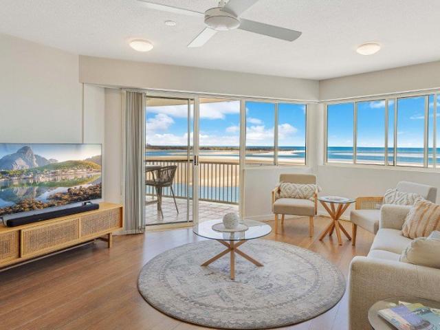 GOLDEN BEACH WATERFRONT LIVING WITH SPECTACULAR WATER & CBD VIEWS