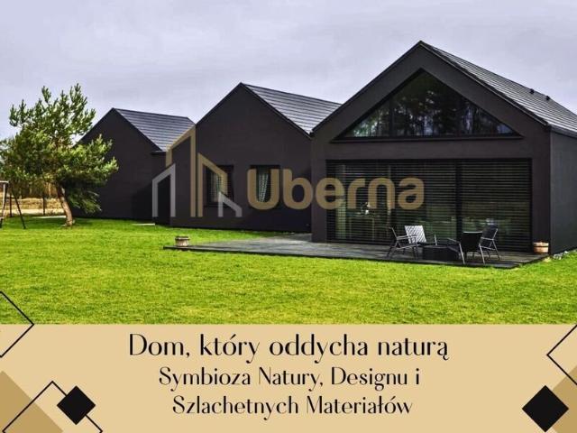 Dom z dużą przestrzenią i naturalnymi materiałami polecam!