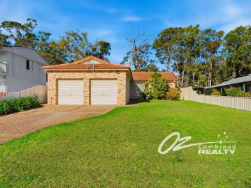 Golf Course Living with Exceptional Garage Space