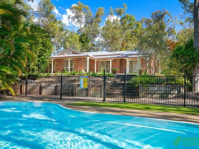 Gorgeous Ranch Style Home With A Sparkling Pool And Enormous 6 Car Shed On A Private Acreage Retreat