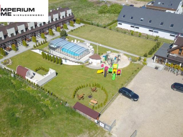 Gotowy ośrodek wypoczynkowy z basenem i fotowoltaiką