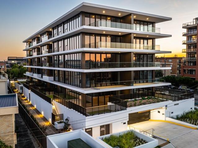 GLASS | Brand New Luxury Beachside Living