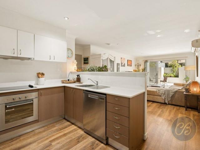 Ground Floor Apartment with Expansive Courtyard Living