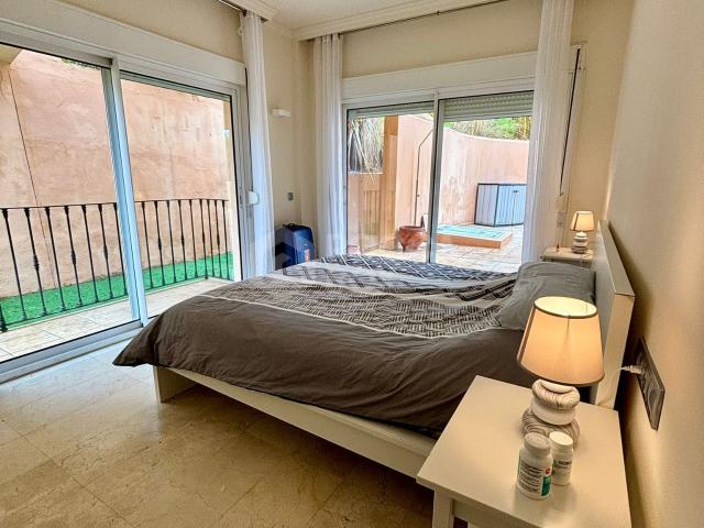 Ground Floor Apartment with Expansive Terrace and Prime Amenities