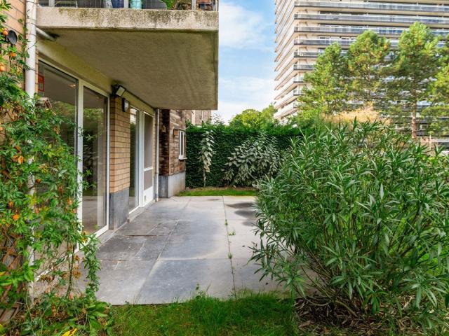 Ground floor apartment with outdoor space and green views