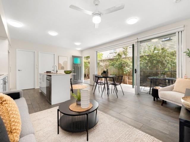 Ground Floor Greenslopes Unit Living + Private Courtyard Entertaining