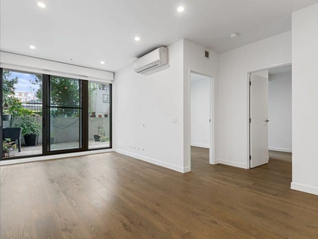 Ground Floor Lifestyle with Private Courtyard & Two Car Parking