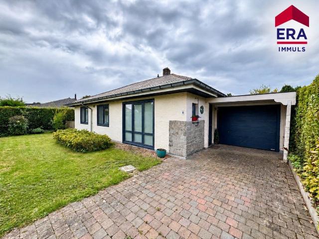 Ground floor property with garden and garage