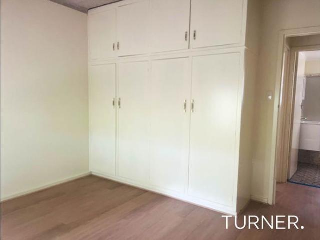 Ground floor unit with new paint and flooring throughout