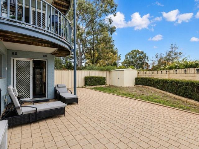 Ground Floor Unit with Big Fenced Yard A Hidden Gem!