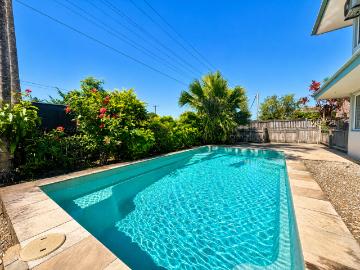 Ground Floor Unit with Private Courtyard & Located in a Gated Complex!