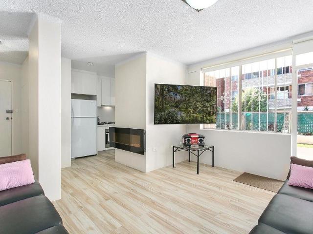 Ground Floor Unit with Private Courtyard & Lock Up Garage