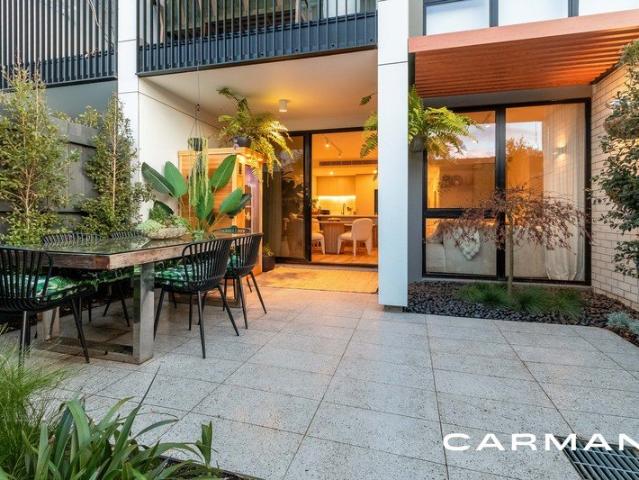 Ground Level Ease with Dual Courtyards