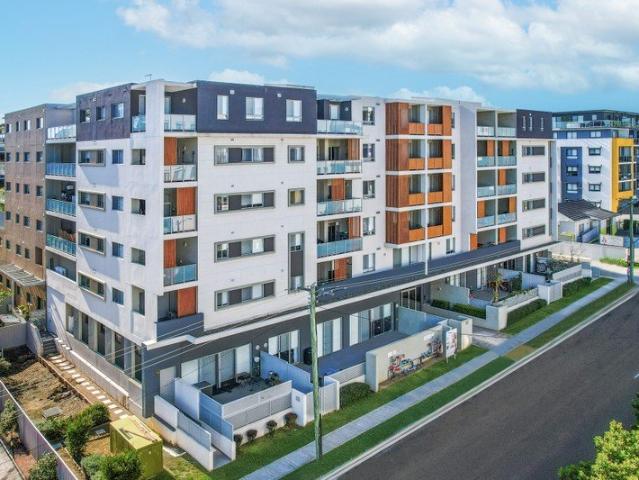 GROUND LEVEL! THREE BEDROOMS! LARGE OUTDOOR DECK!