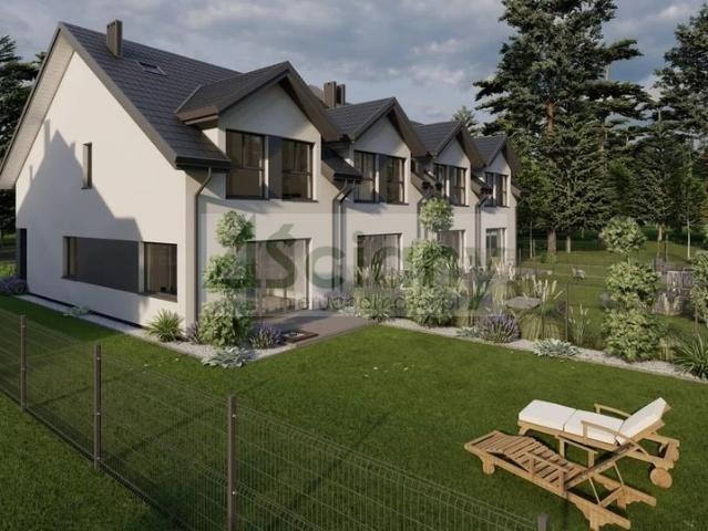 Skrajny segment 104 m2 w Grodzisku z garażem i tarasem
