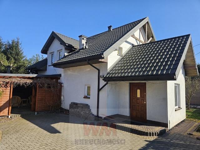 Do sprzedania przestronny dom 115 m² z garażem i budynkiem gospodarczym