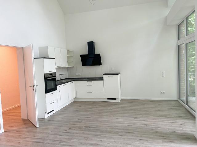 Große Obergeschosswohnung mit Balkon KfW 40