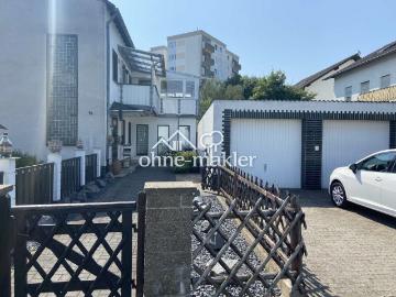 Familienfreundliche 5 Zimmer Wohnung mit eigenem Garten