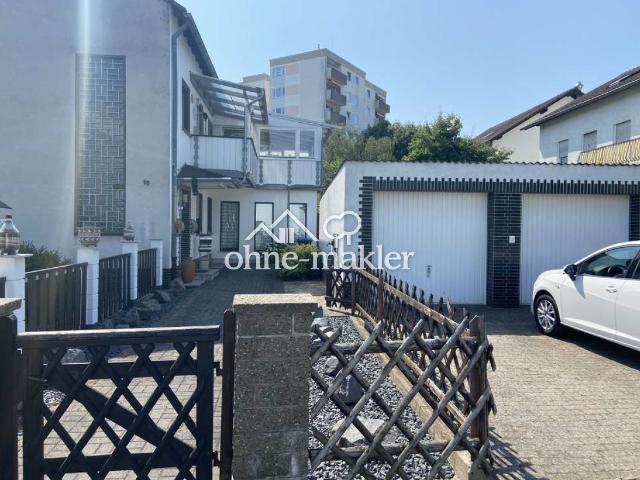 Familienfreundliche 5 Zimmer Wohnung mit eigenem Garten