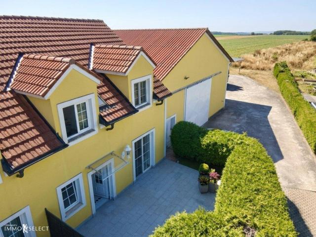 „Großzügige 5 Zimmer Maisonette mit großer Terrasse und Gartennutzung“