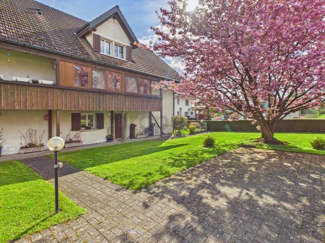 Einzigartige Maisonettewohnung mit Wintergarten und Cheminée in Amlikon Bissegg