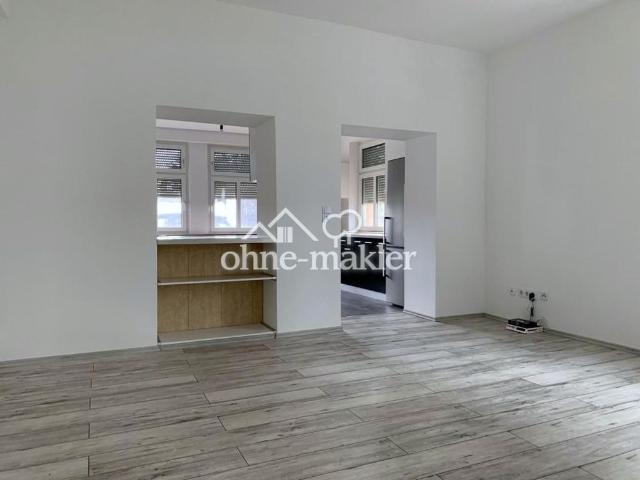 Großzügige 2 Zimmer Wohnung mit eigener Terrasse & Garten – Einbauküche – zentral in Usingen