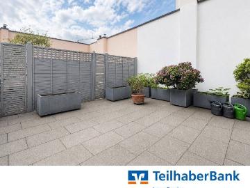 Großzügige 2 Zimmer Wohnung mit sonniger Dachterrasse im ruhigen Rückgebäude