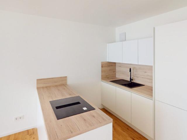 Großzügige 3 Zimmer Neubauwohnung mit Balkon und offener Wohnküche im Rosenstein Quartier