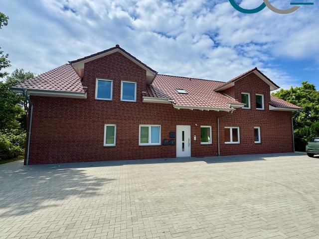 Großzügige 3 Zimmer Neubauwohnung mit Gartenanteil und Balkon in Eystrup!