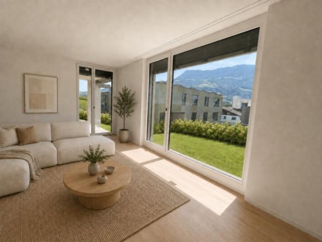 Grosszügige 3.5 Zimmer Gartenwohnung im Erstbezug mit Sitzplatz und idyllischer Grünfläche