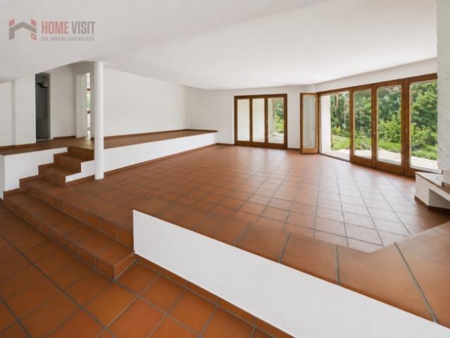 Grosszügige 3.5 Zimmer Gartenwohnung mit Wintergarten & Cheminée