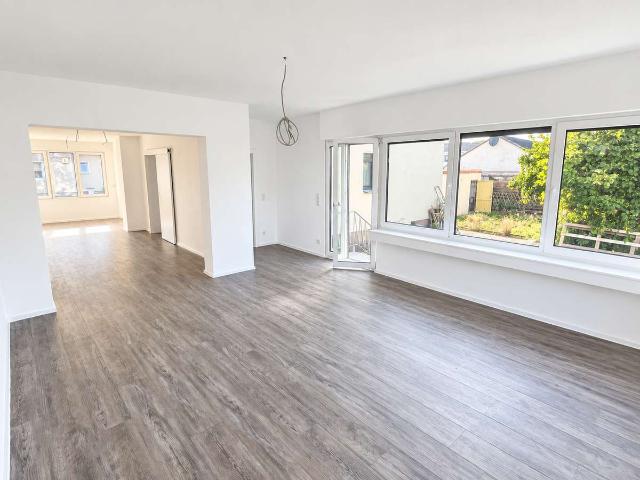 Großzügige 3,5 Zimmer Wohnung mit Garten, Fußbodenheizung & modernem Bad