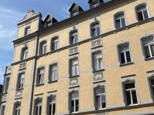 Großzügige und vermietete 1 Zimmer mit EBK, Dusche und Laminat in zentraler Lage!