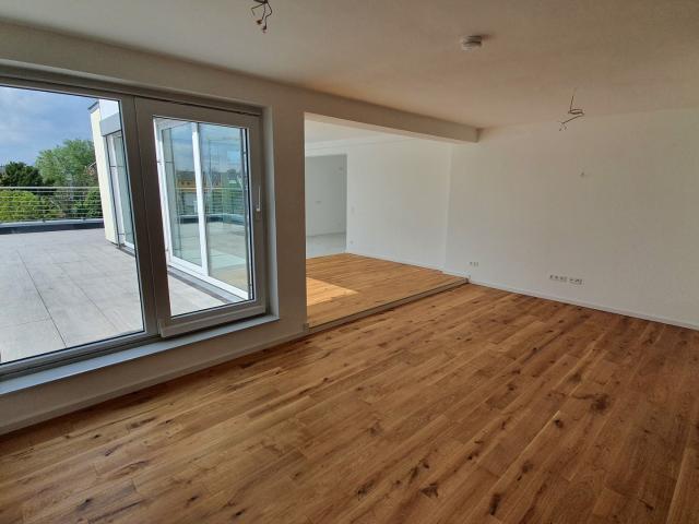 Großzügige Wintergarten Wohnung mit großer Süd Westterrasse in Zentrumnähe
