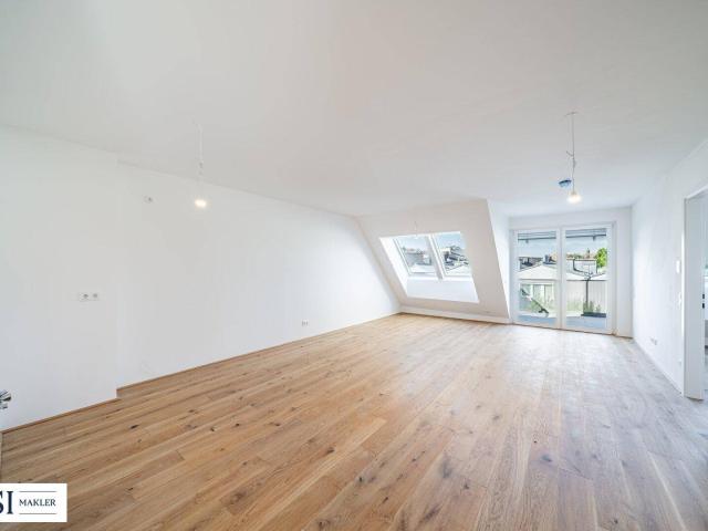 Großzügige Wohnküche als Herzstück der Wohnung