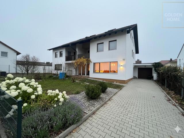 Großzügige Doppelhaushälfte mit Einliegerwohnung, Wintergarten und Entwicklungspotenzial