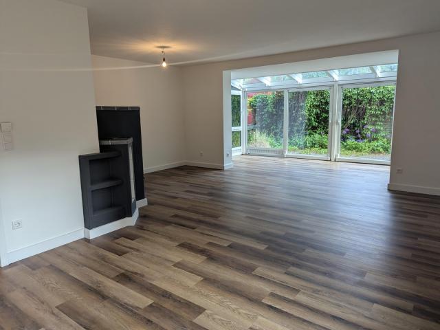 Großzügige Erdgeschosswohnung mit großem Garten, Terrasse & Wintergarten – Erstbezug nach Sanierung