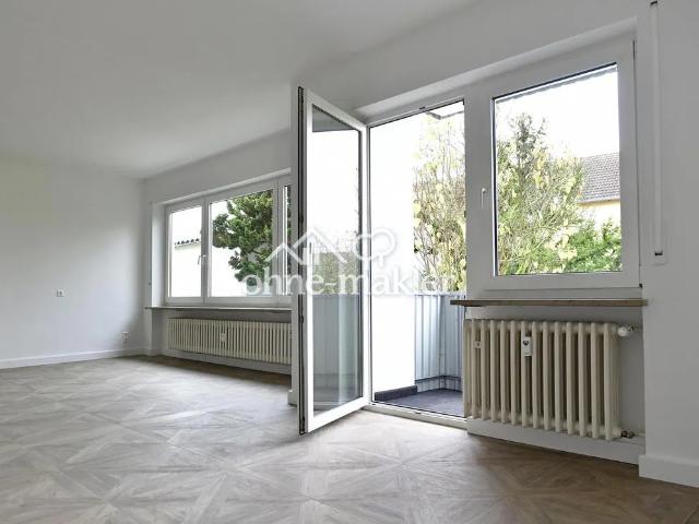 Großzügige, helle 3 Zimmer Erdgeschosswohnung mit Rundumblick ins Grüne