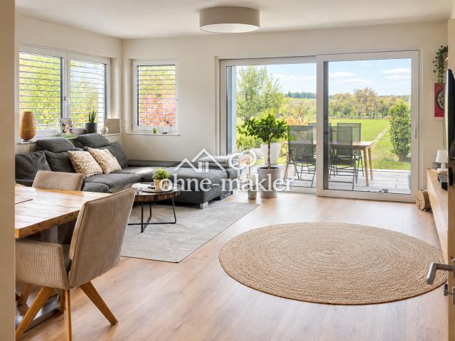 Großzügige, lichtdurchflutete 5 Zimmer Maisonettewohnung mit schön angelegtem Garten