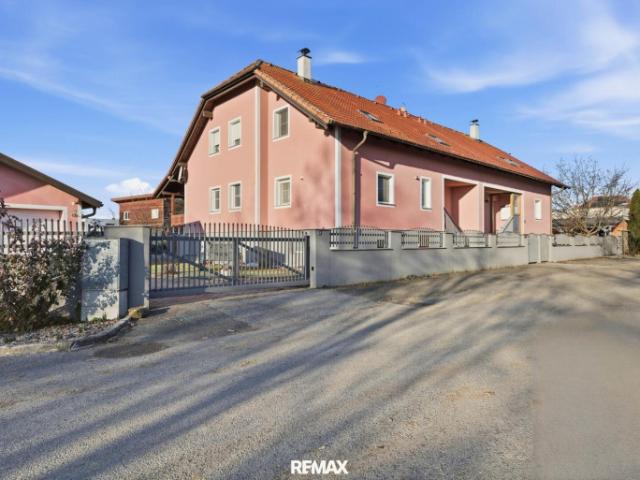 Großzügige Liegenschaft mit Garten, Garage & Terrasse!