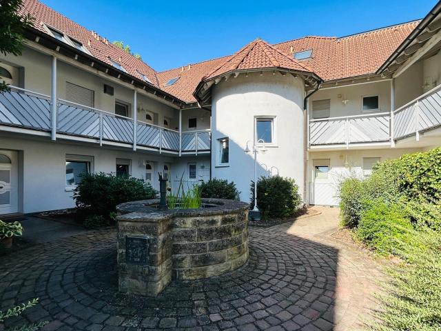 Großzügige Maisonette mit Kamin, Loggia und Tiefgaragenstellplatz